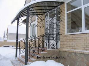 Photo of wrought iron railings and wrought iron porch canopy