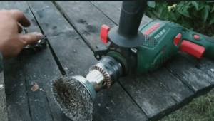 photo: brush attachment for a drill for cleaning a barbecue before painting