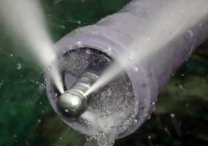 Hydrodynamic cleaning of sewer pipes.