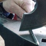 A good forged ax can cut a nail