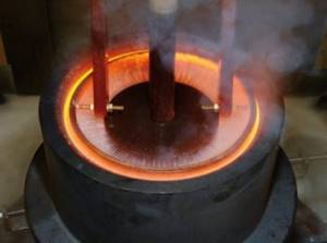 Induction furnace for metal hardening