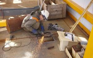 Using a face shield when working with an angle grinder