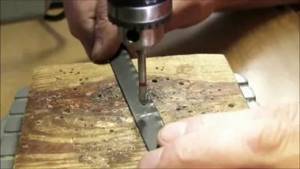 How to drill a hacksaw blade through metal?