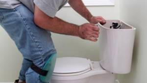 How to disassemble a toilet cistern with a button