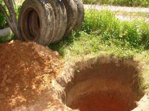 how to make a drain pit from tires