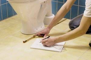 How to install a toilet on tiles with your own hands