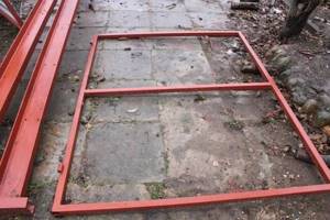 Wicket frame with welded hinges