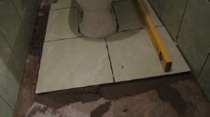 Laying beautiful tiles around an installed toilet is by no means an easy task!