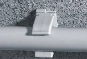 Fastening PVC pipes to the wall