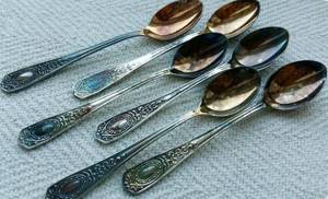 Spoons with silver inserts