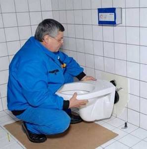 Installation of a wall-hung toilet