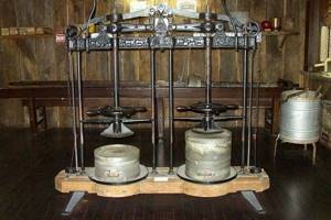 In the photo - an antique cheese press