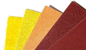 Sandpaper for grinding machines