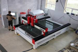 What determines the cost of waterjet metal cutting?