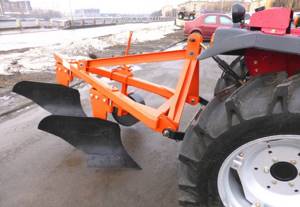 Plow for mini tractor
