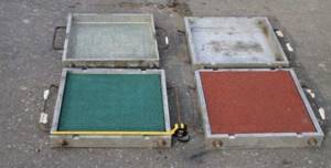Molds for the production of rubber tiles