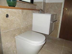 side-mounted toilet with hidden cistern