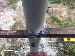 weld a corner to a round fence post