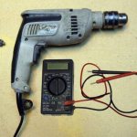 Checking a drill with a multimeter