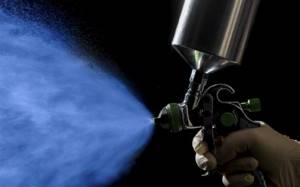 Spraying with a spray gun