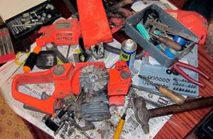 Disassembled chainsaw