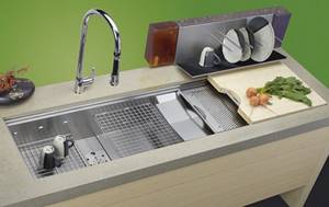 Grids and cutting boards – these kitchen sink accessories will enhance your ambience