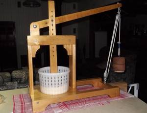 This is how a Danish manual cheese press works.