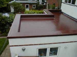 Installation of a flat roof with internal drainage and installation of a drainage funnel