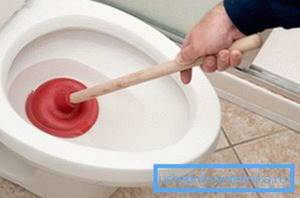 A plunger (pictured) is one of the most effective ways to remove a clog in a toilet.