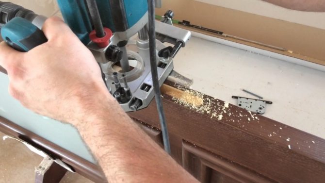 Cutting a hole in the door with a router