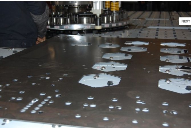 Punching holes in sheet metal